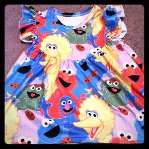 SESAME STREET custom boutique pearl tunic/top 💛